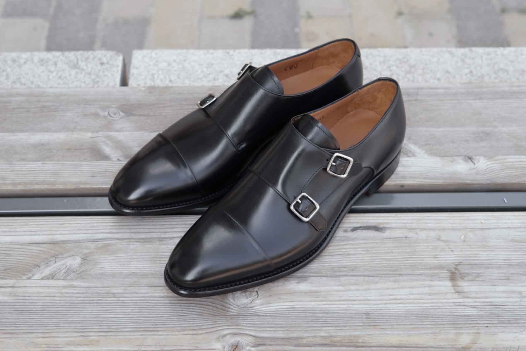 Carlos Santos 9975 Reversed Stitched Double Monk Strap Shoes in Black Calf on Wooden Surface