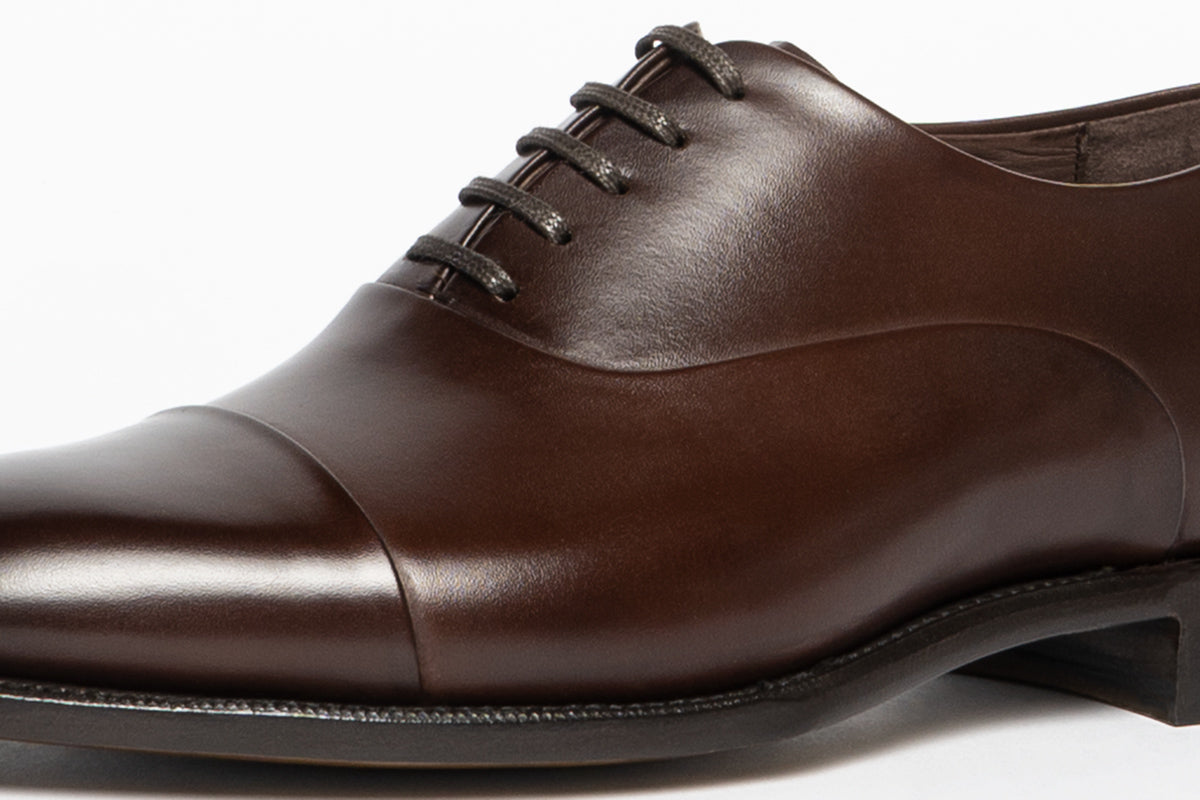 Carlos Santos 9899 Brown 1