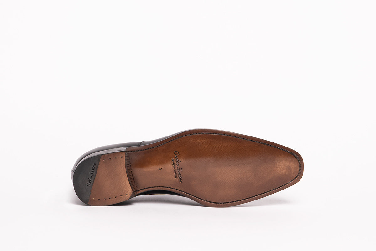 Sole view of Carlos Santos 8627 Cap-Toe Oxford in Black Calf, Goodyear Welted with leather sole, style reference 8627.